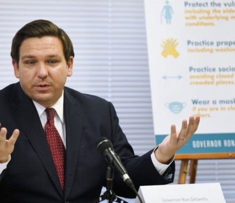 Florida Gov. Ron DeSantis addresses a panel during a roundtable discussion in Jacksonville.