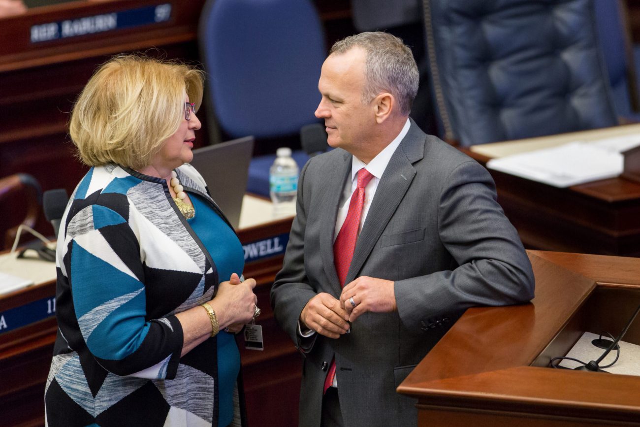 House Democratic Leader Janet Cruz, shown here with House Speaker Richard Corcoran, worries Hispanic communities face bigger challenges with returning to school.
