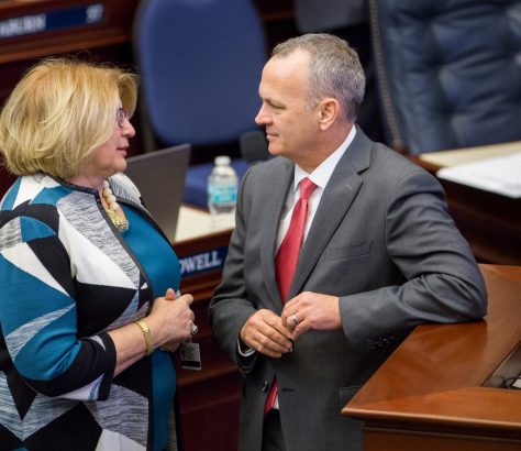 House Democratic Leader Janet Cruz, shown here with House Speaker Richard Corcoran, worries Hispanic communities face bigger challenges with returning to school.