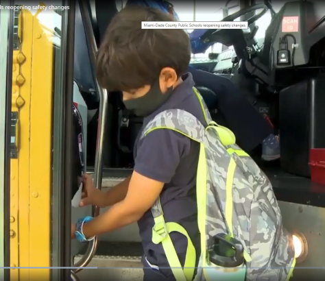 school bus with hand sanitizer