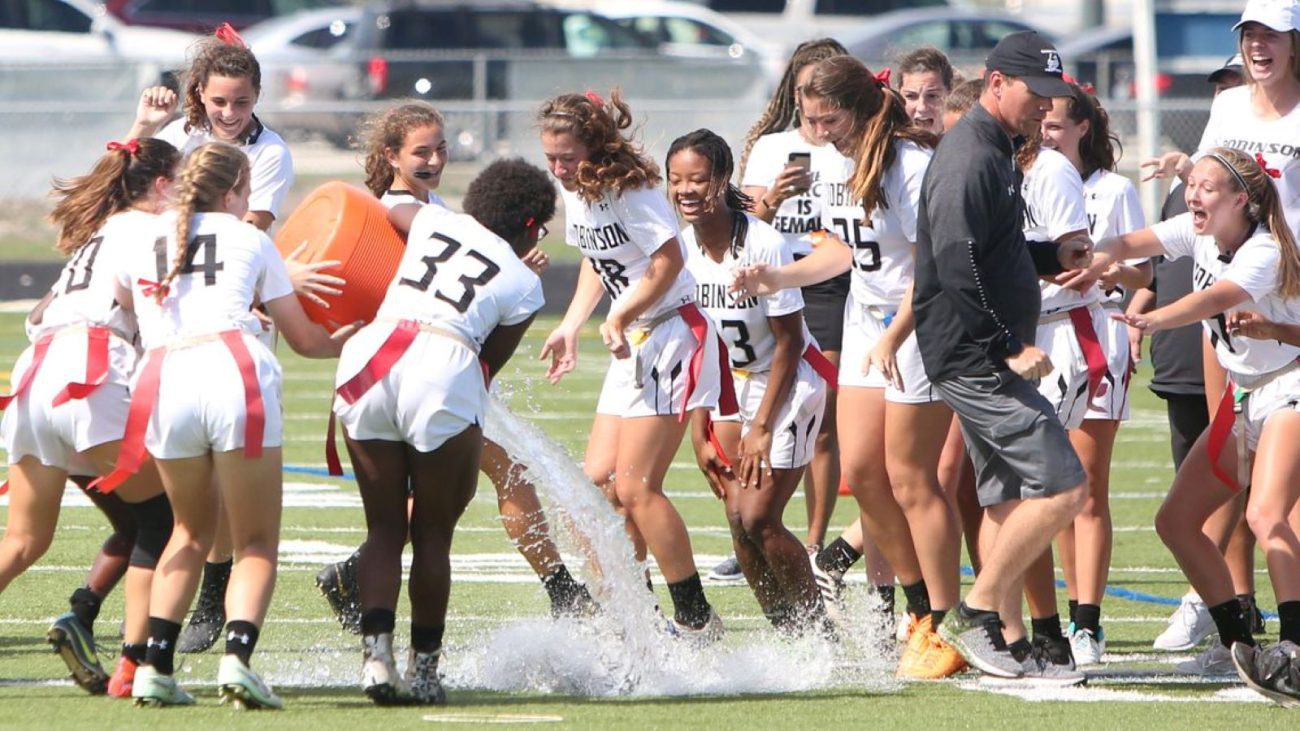 BOCA RATON - Robinson may have won the Class 1A state flag football title for the fourth straight time, but they did miss on the Gatorade shower for coach Josh Saunders, dodging in black cap at right. Scott Purks, Special to the Times [ SCOTT PURKS | Special to the Times ]