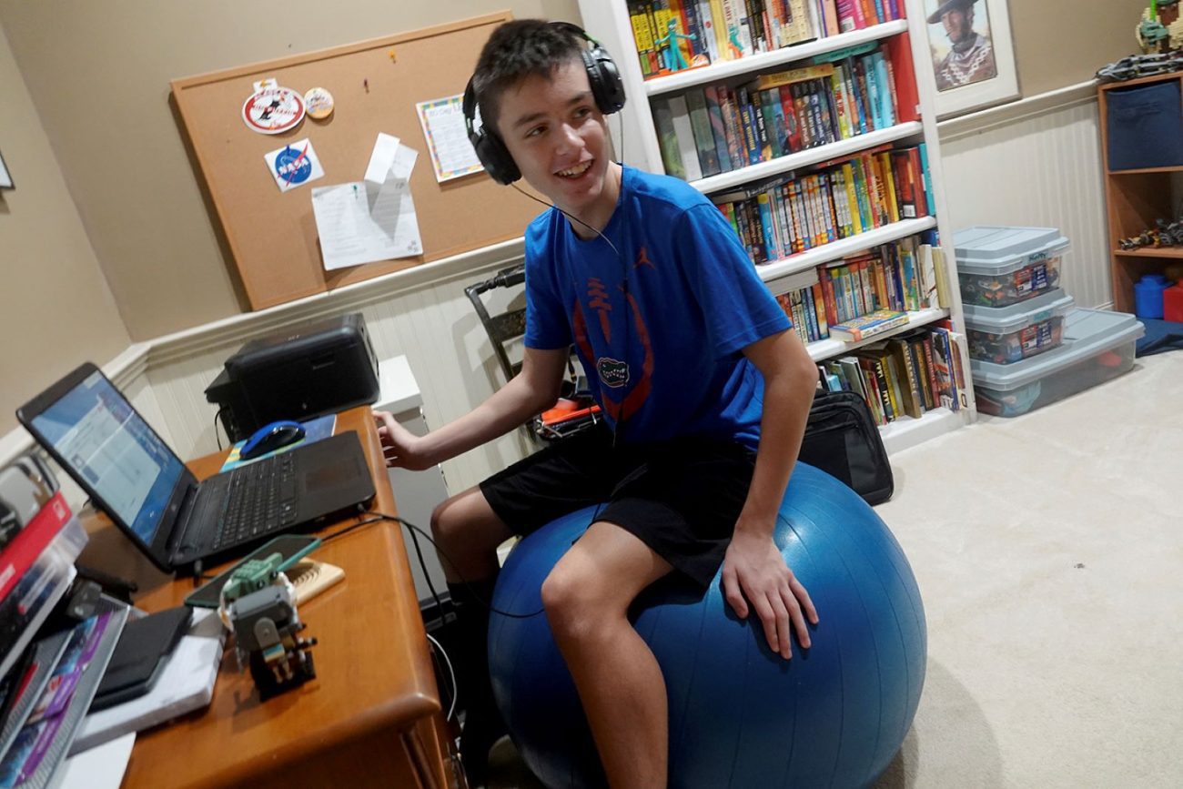 Andrew Burstein, 13, participates in a virtual class through Don Estridge High Tech Middle School in Delray Beach, Fla., this school year.