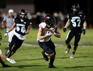 Creekside receiver Jack Goodrich, center, makes a catch and run in the first quarter during a Week 10 game at Ponte Vedra. (Ralph D. Priddy) (News4Jax)