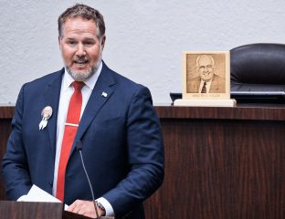 Clay Miller honored his father, Walter, during a ceremony at the Manatee County School Board building in downtown Bradenton